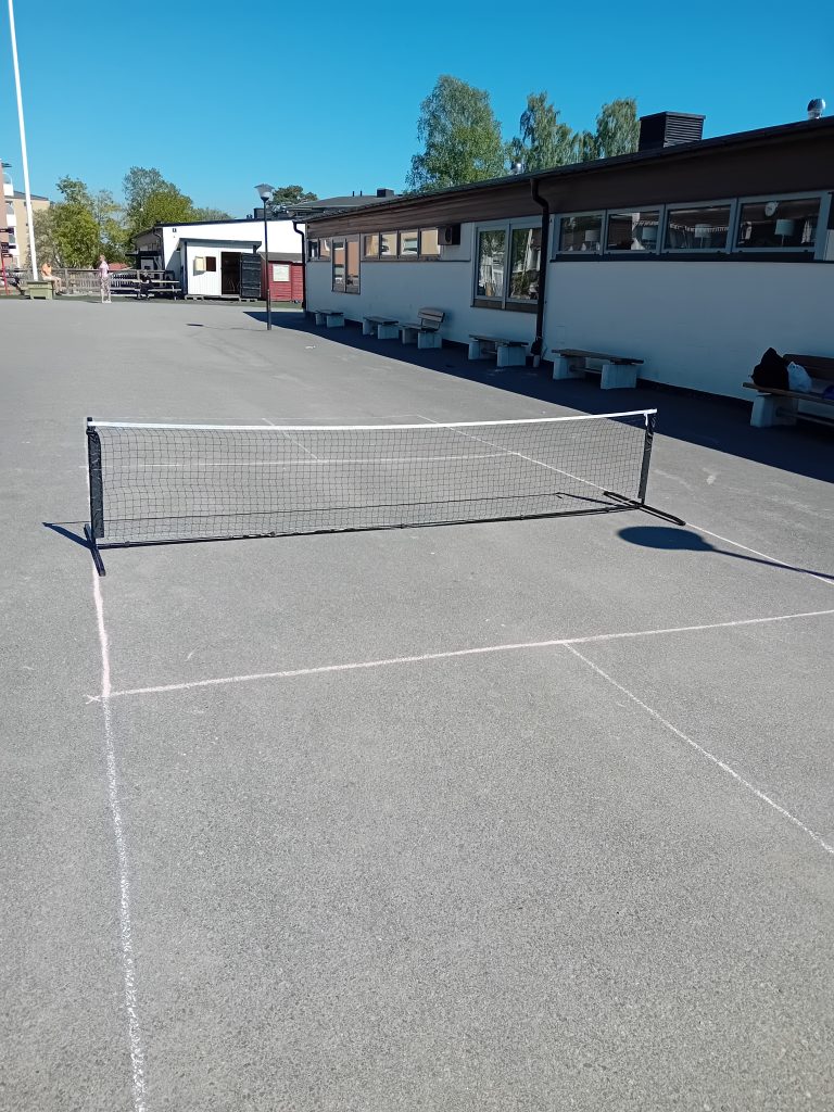 A temporary court made with chalk to grow the game of pickleball with Korpen.